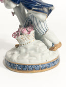 Statuina in Porcellana di Sevres di Giovane con Fiori Anni 40