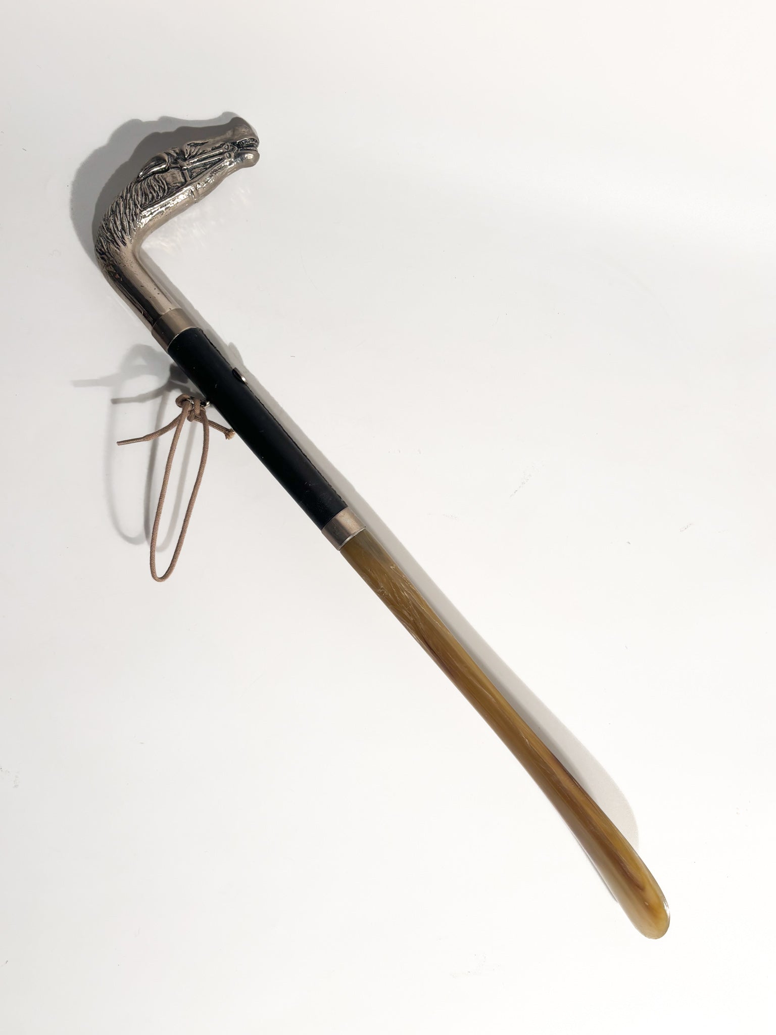 Gucci shoehorn with horse head in silver metal, leather, and resin, 80s