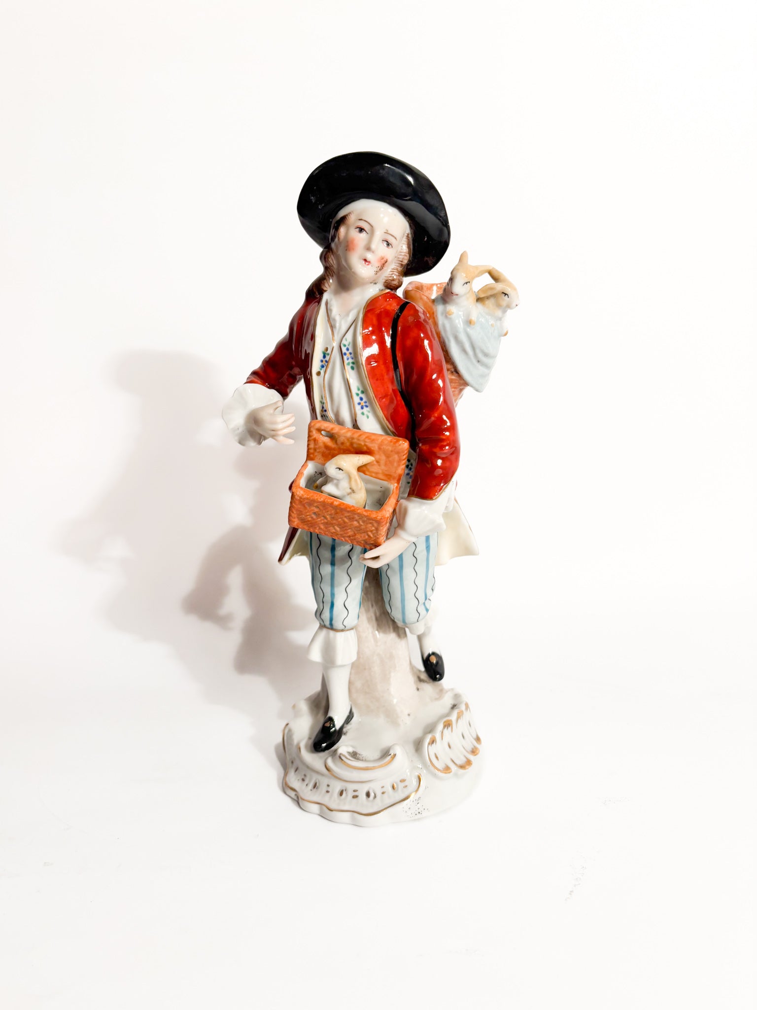 Polychrome Porcelain Figurine Sitzendorf of Rabbit Seller from the 1800s