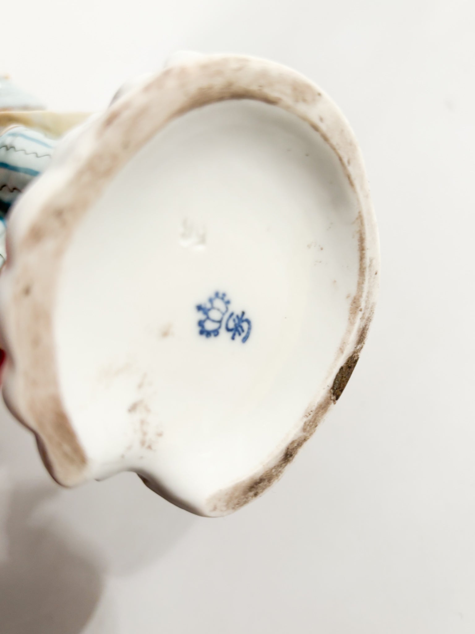 Polychrome Porcelain Figurine Sitzendorf of Rabbit Seller from the 1800s