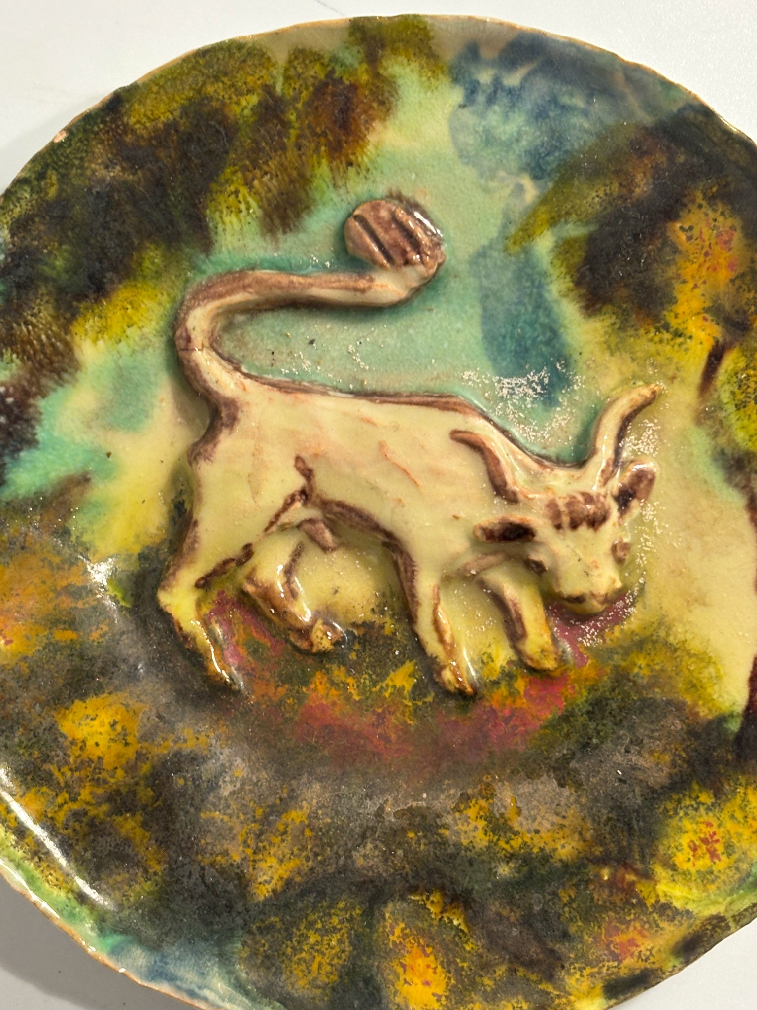 Ceramic Plate Worked in Relief and Hand-Painted Faenza School 20th Century