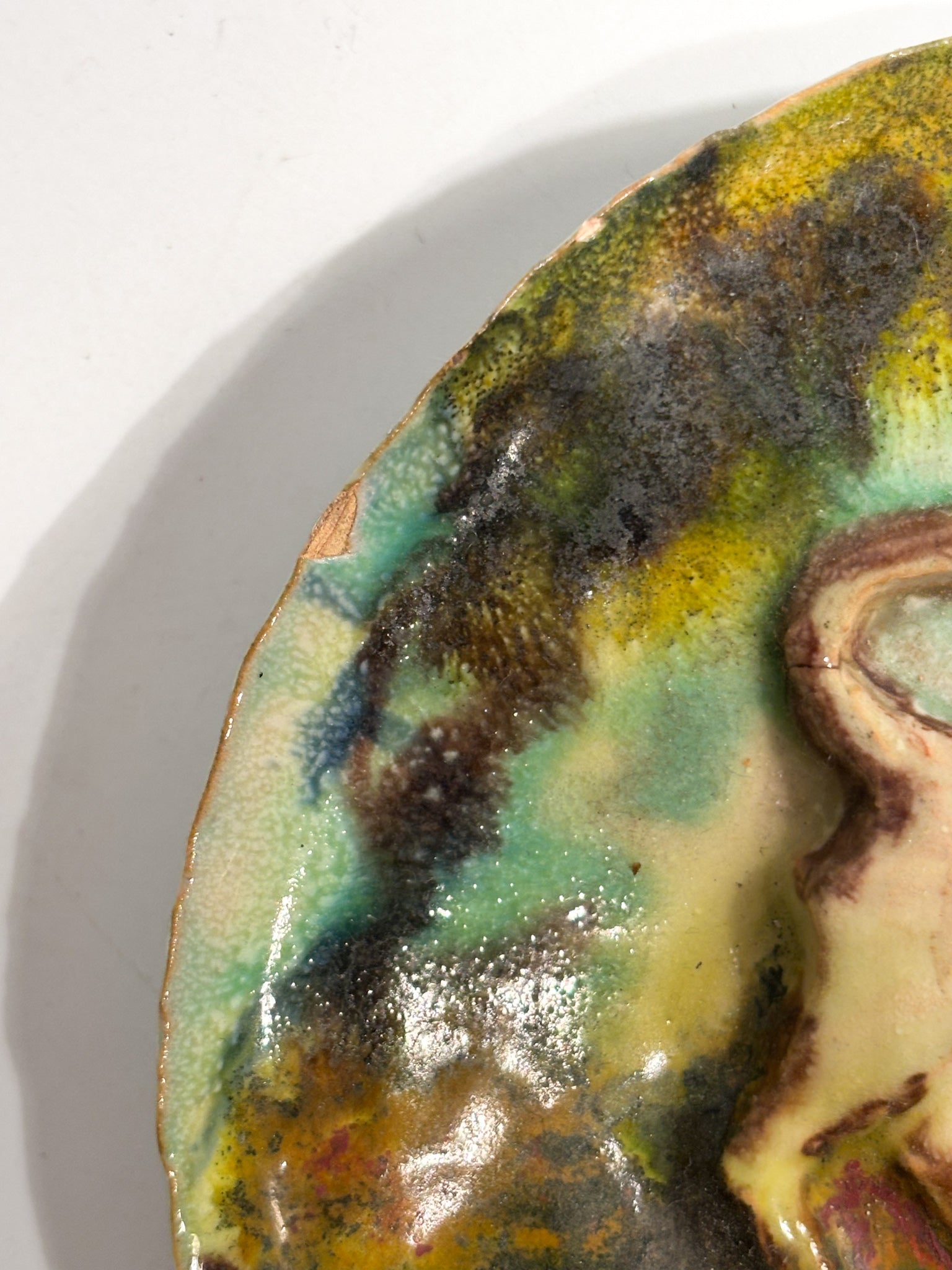 Ceramic Plate Worked in Relief and Hand-Painted Faenza School 20th Century