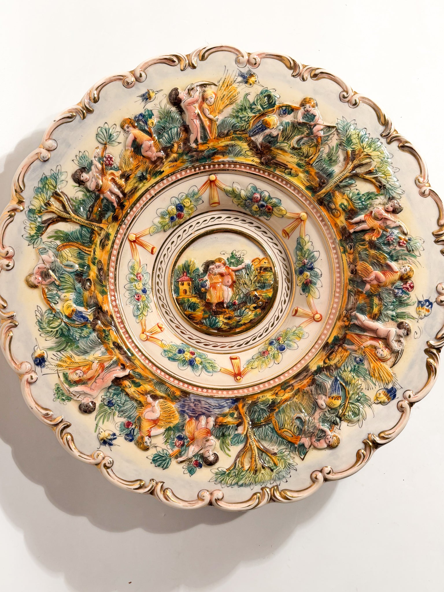 Large Plate in Capodimonte Porcelain Hand-Painted and Worked in Relief 1950s