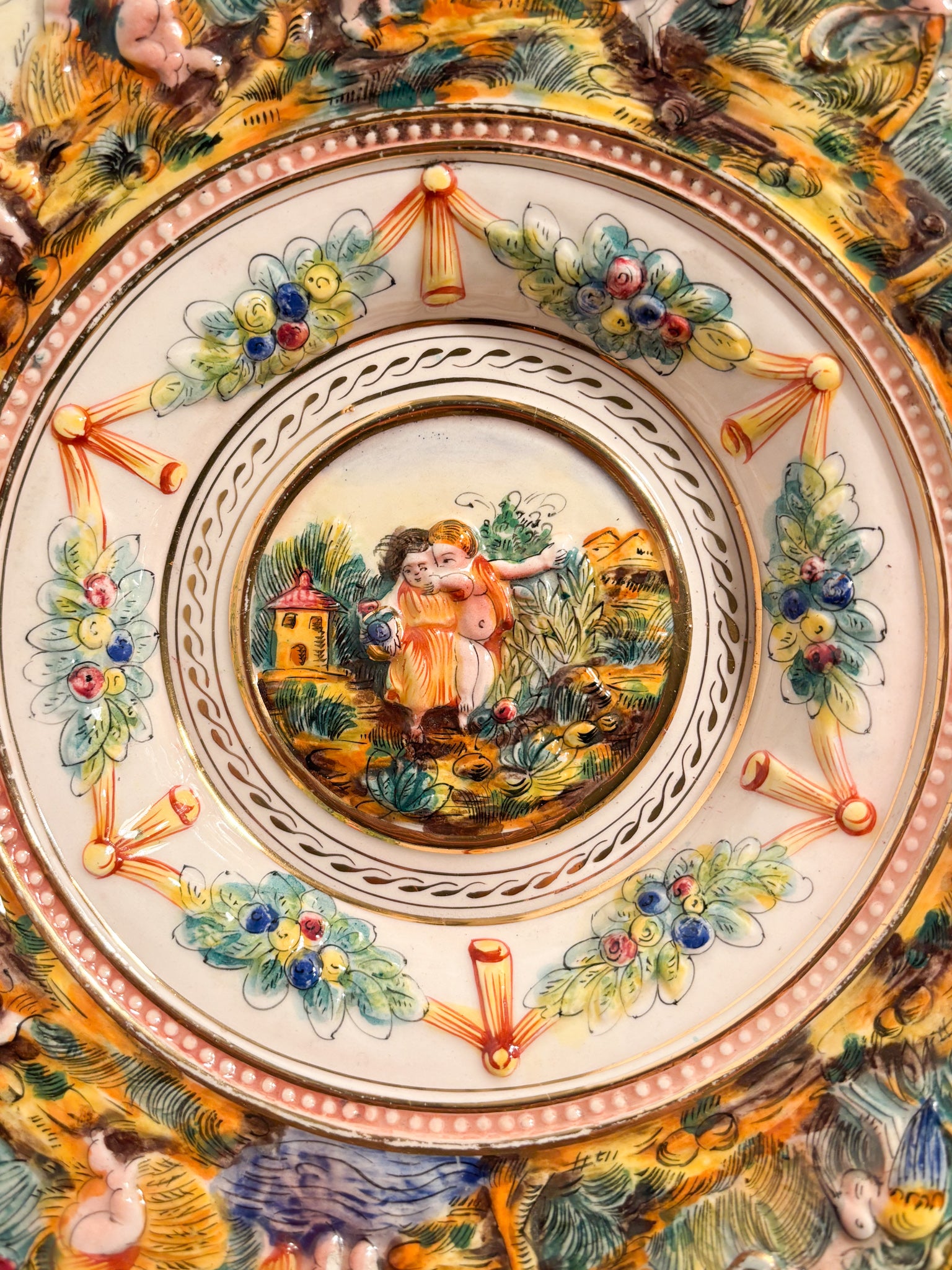 Large Plate in Capodimonte Porcelain Hand-Painted and Worked in Relief 1950s