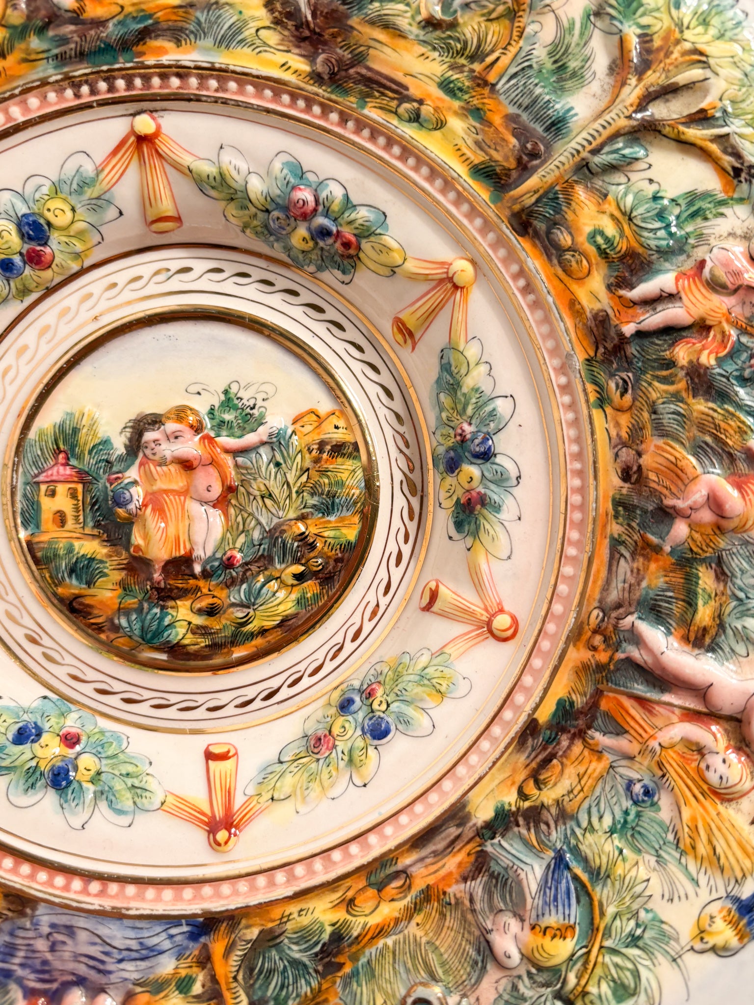 Large Plate in Capodimonte Porcelain Hand-Painted and Worked in Relief 1950s