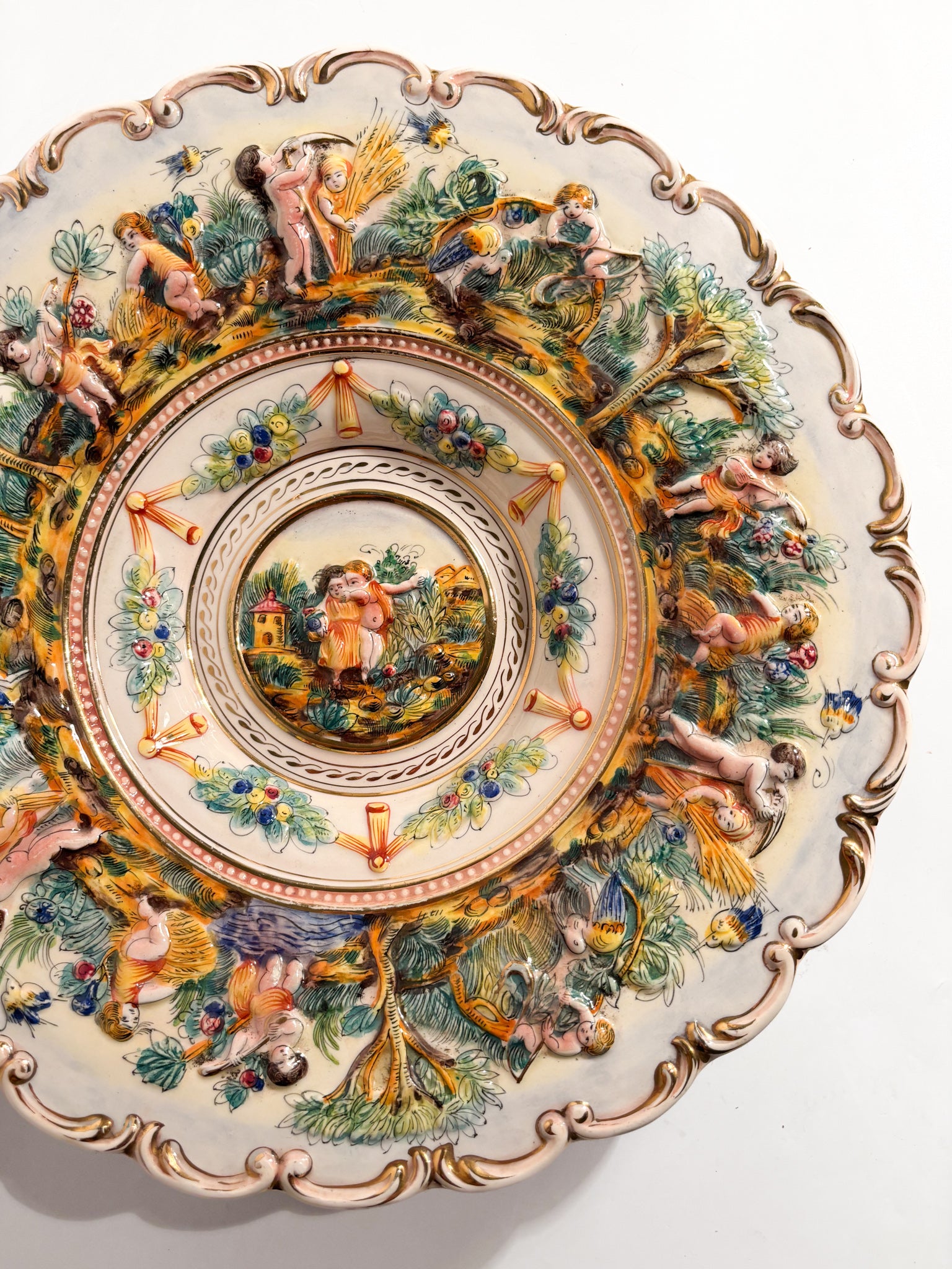 Large Plate in Capodimonte Porcelain Hand-Painted and Worked in Relief 1950s