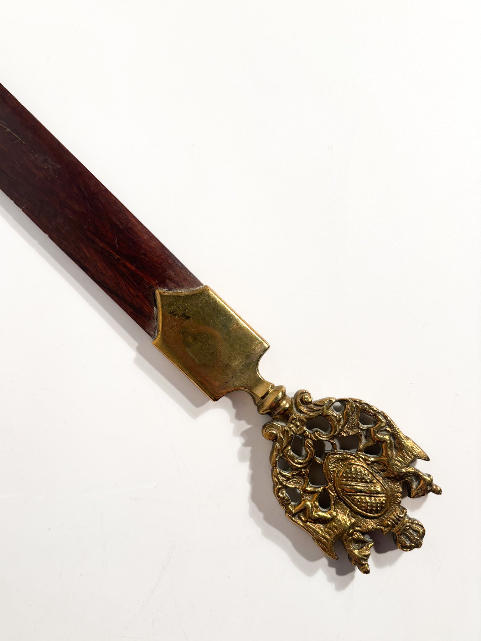 Letter opener with gilded bronze emblem and wood, 1930s