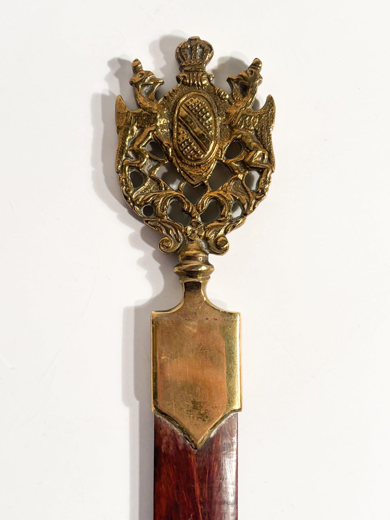 Letter opener with gilded bronze emblem and wood, 1930s