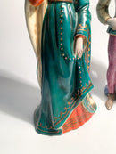 Pair of figurines of a lady and a gentleman in ceramic by Zaccagnini from the 1940s