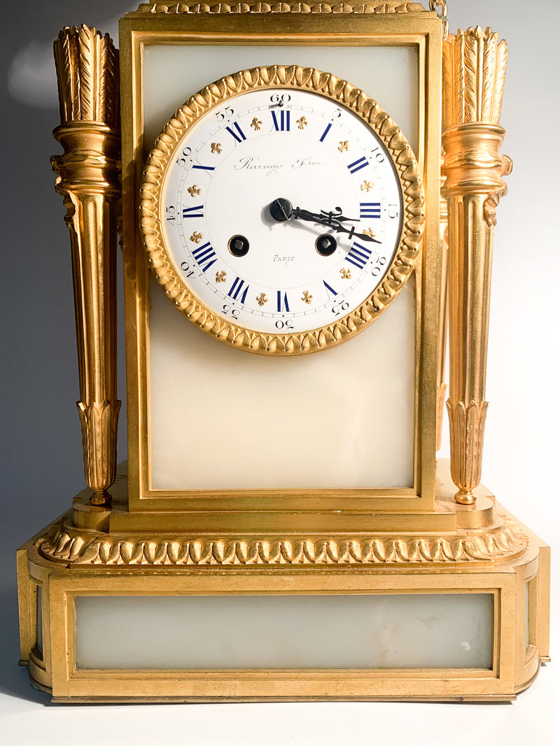 Raingo Frères Louis XVI Style Table Clock in Alabaster and Gilded Bronze from the 1800s