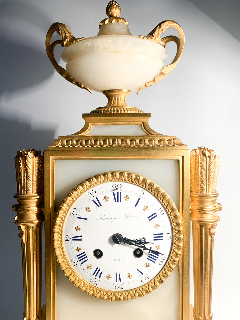 Raingo Frères Louis XVI Style Table Clock in Alabaster and Gilded Bronze from the 1800s