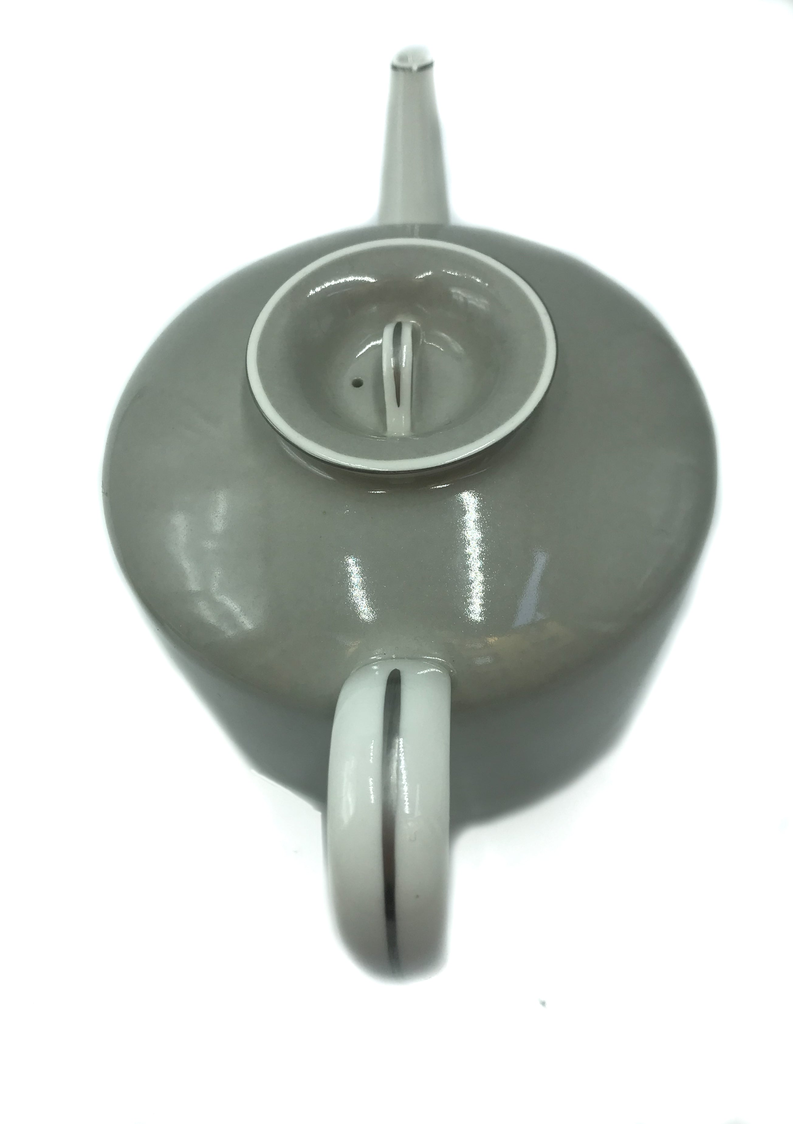 Pair of German Ceramic Cups with Teapot and Milk Jug